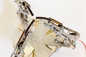 Angled view of the upper platform, finger bases, and cable routing